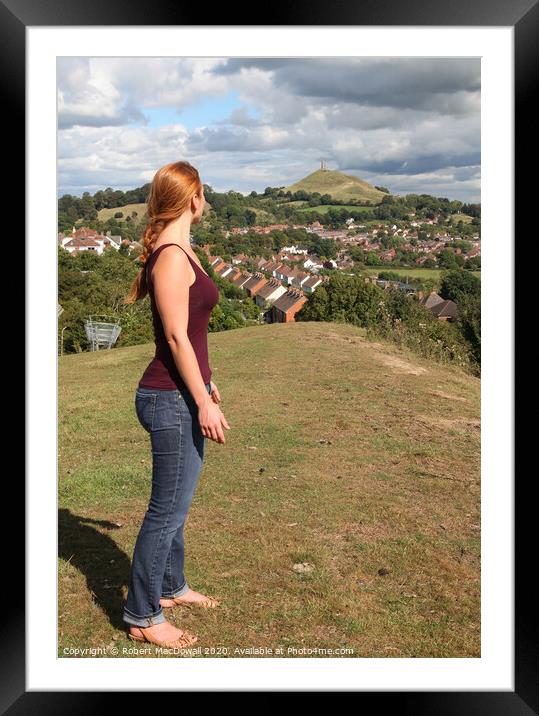 Admiring the view of Glastonbury Tor from Wearyall Framed Mounted Print by Robert MacDowall