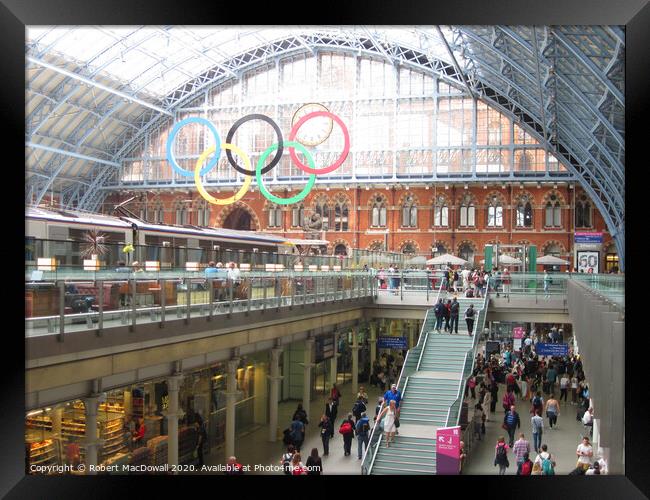 St Pancras International Station and the Olympic rings Framed Print by Robert MacDowall