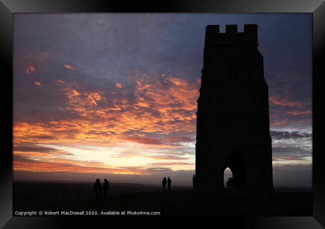 Sunset behind St Michael's Tower on Glastonbury Tor Framed Print by Robert MacDowall