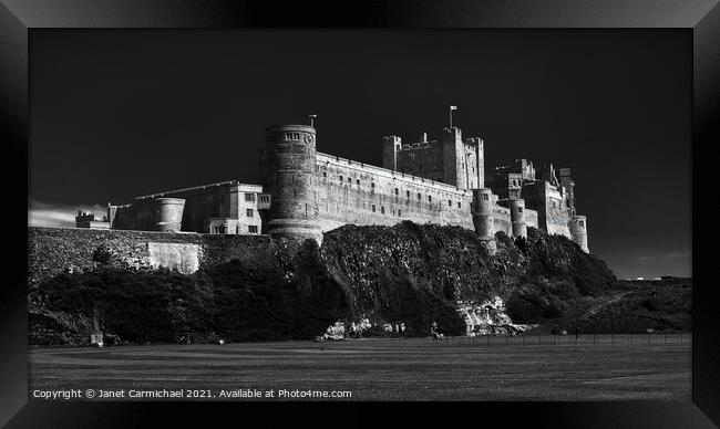 Iconic Bamburgh Castle Framed Print by Janet Carmichael