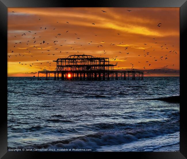 Starlings Circling at the West Pier Framed Print by Janet Carmichael