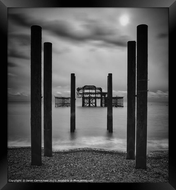 Brighton West Pier in Monochrome Framed Print by Janet Carmichael