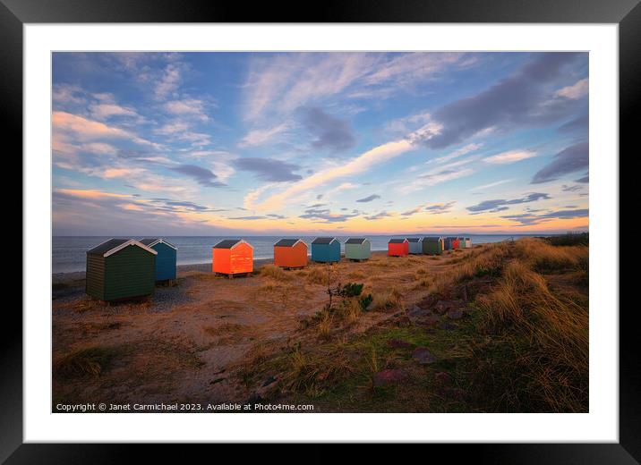 Vibrant Beach Huts by the Calm Findhorn Bay Framed Mounted Print by Janet Carmichael