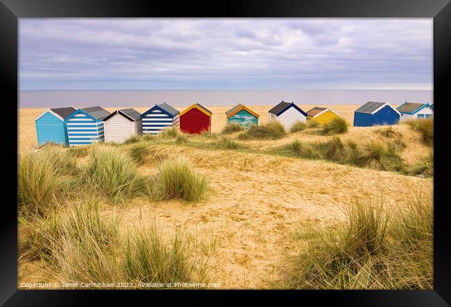 Vibrant Southwold Beach Huts Framed Print by Janet Carmichael