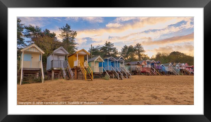 Rainbow Coloured Beach Huts at Wells Next the Sea Framed Mounted Print by Janet Carmichael