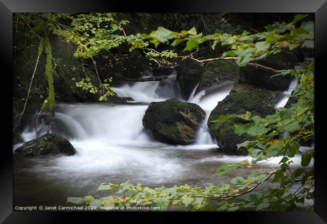 Tranquil Autumn Cascade Framed Print by Janet Carmichael