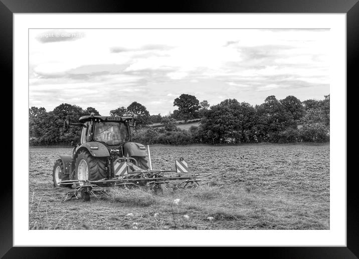 Black and white Tractor in a field  Framed Mounted Print by Ollie Hully