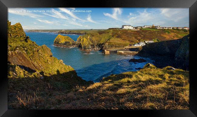 View of Mullion harbour from the cliff top Framed Print by Paul Richards