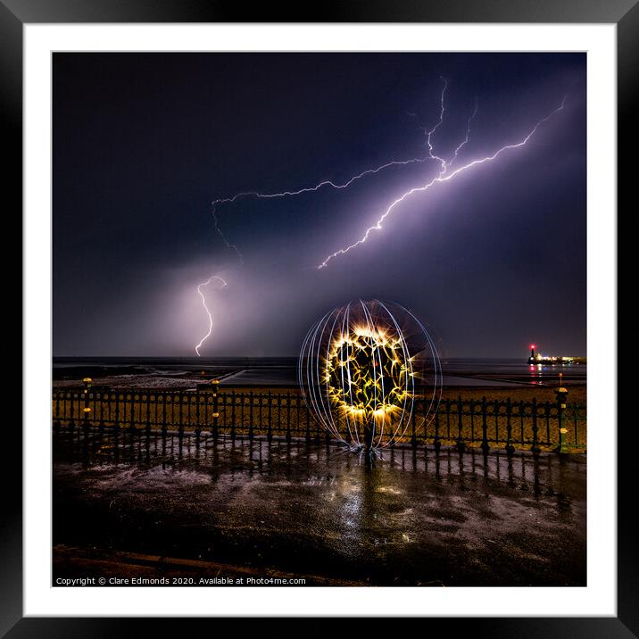 Lightning Strikes Framed Mounted Print by Clare Edmonds