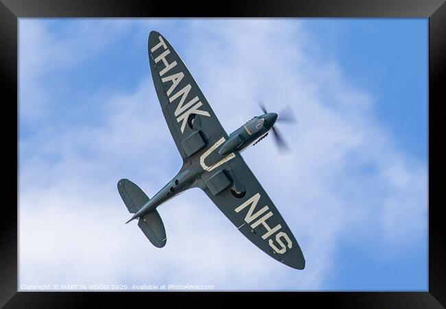 NHS Spitfire flight Framed Print by MARTIN WOOD