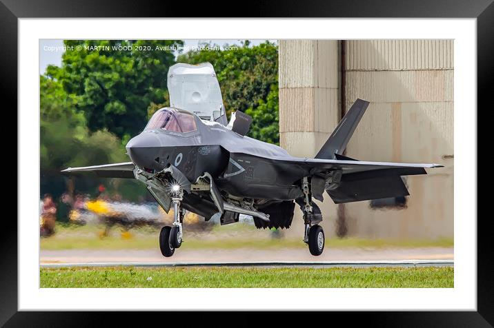 RAF F-35B Lightning vertical touch down. Framed Mounted Print by MARTIN WOOD