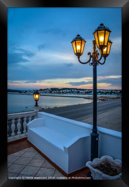 Lamps at Sunset Framed Print by Harris Maidment