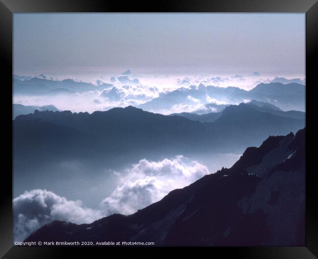 Alpine Clouds Framed Print by Mark Brinkworth