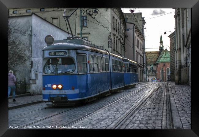 Krakow Tram  Framed Print by Jim McGarvie