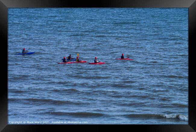 A Crowd of Kayaks. Framed Print by Mark Ward