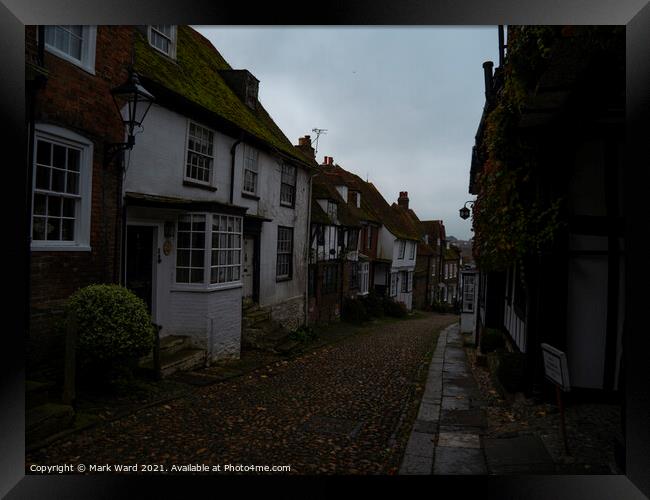 A Cobbled Rye Street in Autumn. Framed Print by Mark Ward