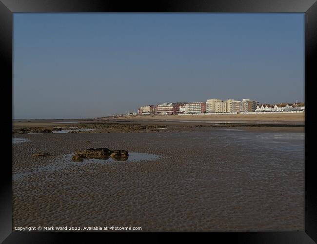 Bexhill from the beach at low tide. Framed Print by Mark Ward