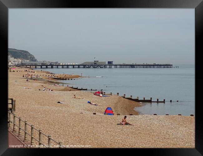 Hastings Beach on a Hazy Lazy Day in June. Framed Print by Mark Ward