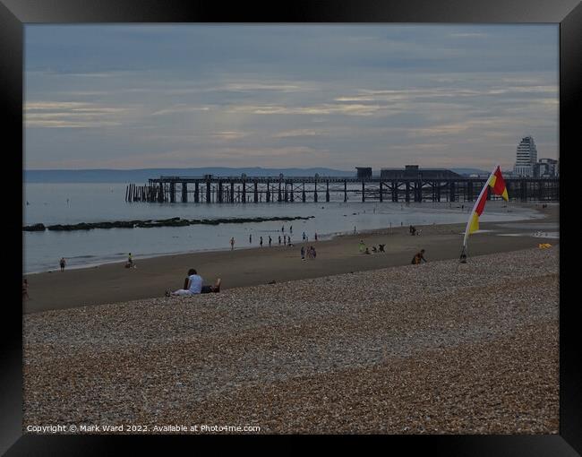 Early Summer evening on Hastings beach Framed Print by Mark Ward