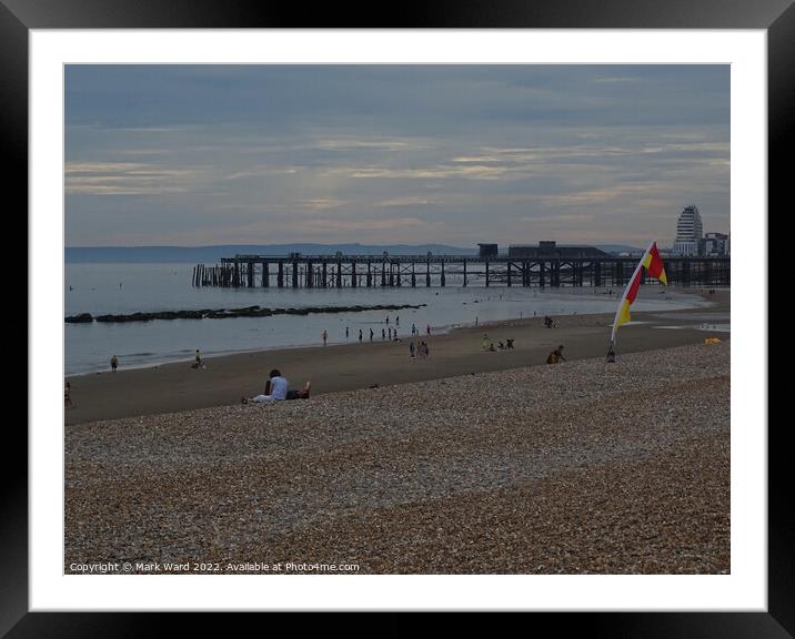 Early Summer evening on Hastings beach Framed Mounted Print by Mark Ward