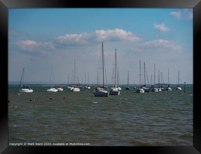 Yachts moored near Hayling Island. Framed Print by Mark Ward