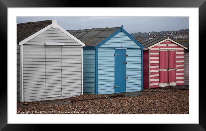 The British Beach Hut. Framed Mounted Print by Mark Ward