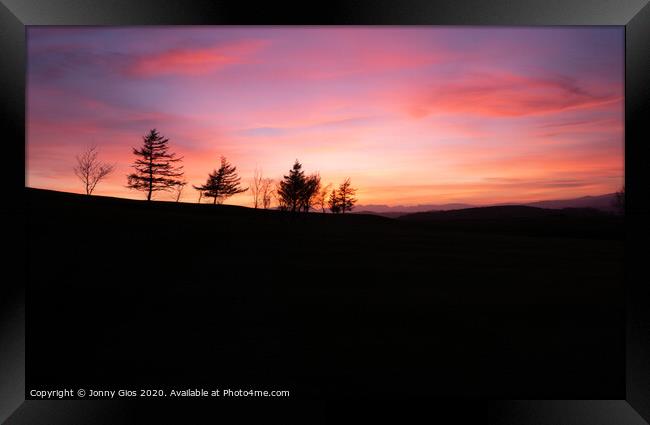 Sunset Silhouette Framed Print by Jonny Gios