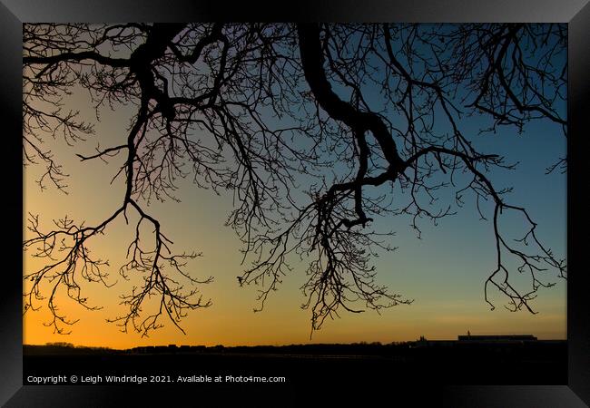 Silhouettes and Sunset Colours Framed Print by Leigh Windridge