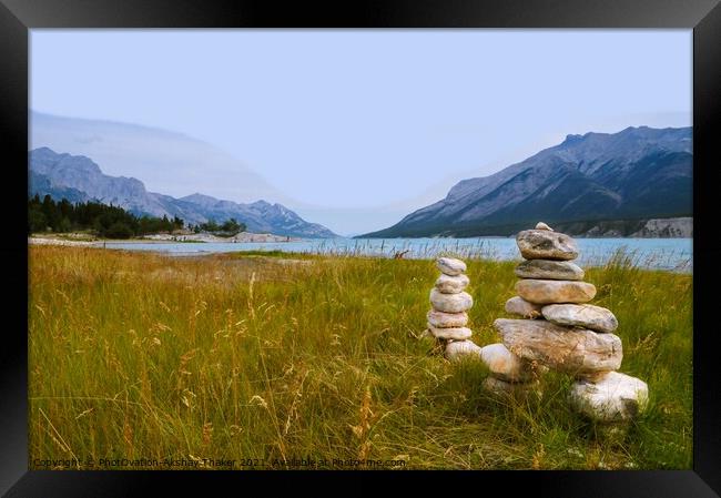 An inuksuk is a figure made of piled stones Framed Print by PhotOvation-Akshay Thaker