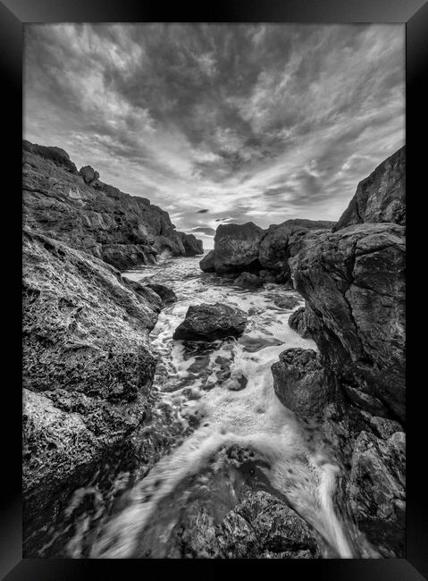 Photograph with a dramatic landscape between the rocks in a small cove Framed Print by Vicen Photo