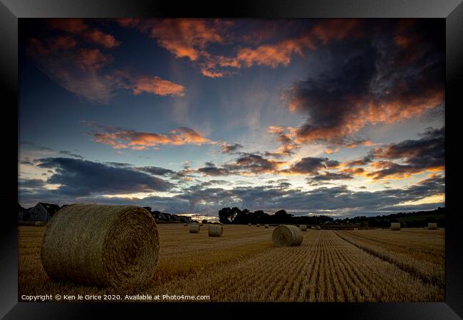 Straw bale sunset Framed Print by Ken le Grice