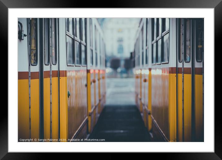 Between two yellow trams Framed Mounted Print by Sergio Falzone