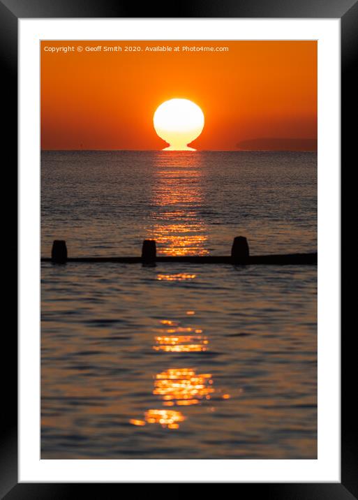 Sun touching the sea Framed Mounted Print by Geoff Smith
