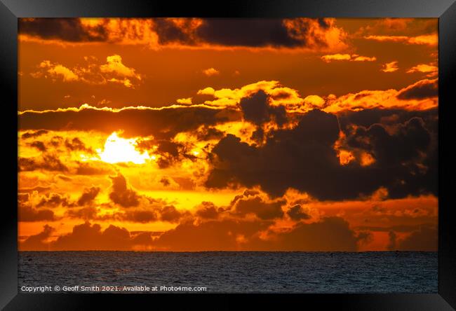 Cloudy Sunset at Sea Framed Print by Geoff Smith