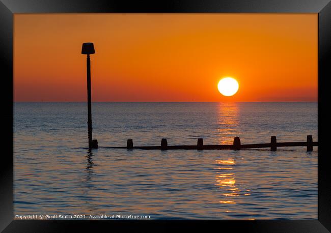 Sunset Reflecting at Sea Framed Print by Geoff Smith
