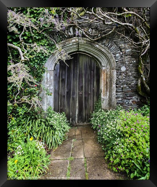 Old Wood Door in Stone Wall Framed Print by Allan Bell