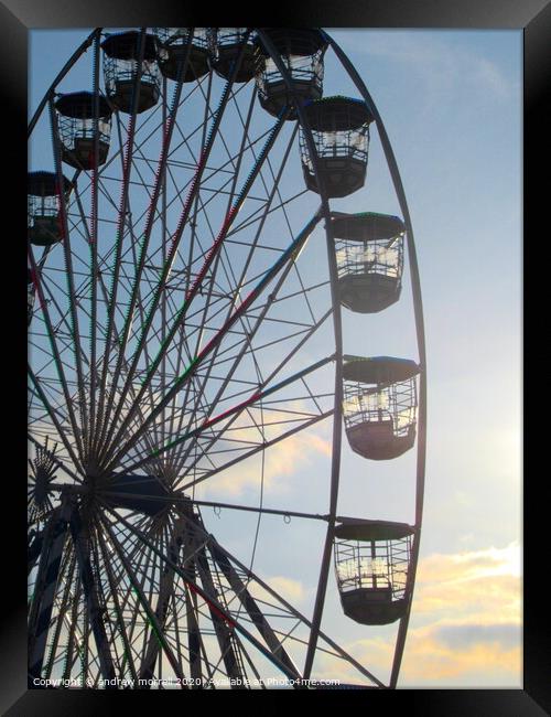 Ferris Wheel At Sunset Framed Print by andrew morrell