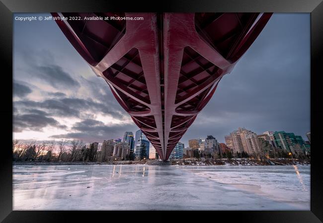 Peace Bridge over frozen Bow River Framed Print by Jeff Whyte