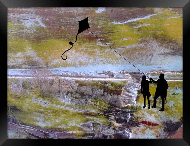 Flying A Kite Framed Print by Robert Fennah