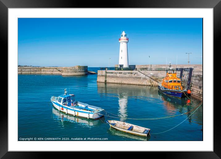 "The Serene Beauty of Donaghadee Lighthouse" Framed Mounted Print by KEN CARNWATH