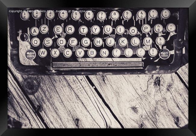 Old and weathered antique typewriter keyboard on wooden background in greyscale. Framed Print by Kristof Bellens