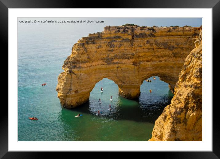Kayaks and sup boards peddling under the Arco Natural on the Algarve coast in Portugal. Framed Mounted Print by Kristof Bellens