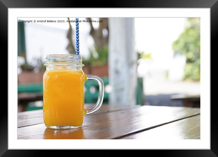 Horizontal shot of a jar of homemade orange juice Framed Mounted Print by Kristof Bellens