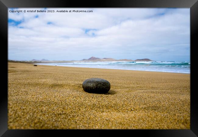 Empty beach with black stone in the foreground Framed Print by Kristof Bellens