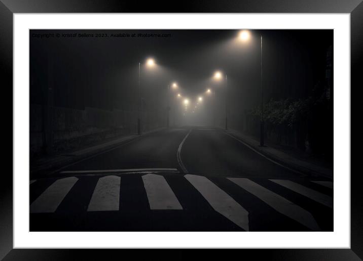 Night shot of a desolate, empty and abandoned city street with streetlights illuminating the road Framed Mounted Print by Kristof Bellens