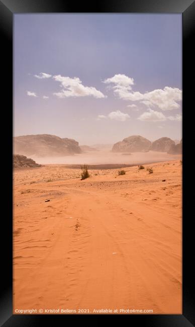 Vertical desert off road track leading into the mountains of Wadi Rum. Framed Print by Kristof Bellens