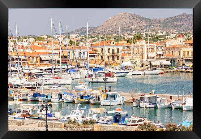 Bustling port of Aegina Framed Print by Laszlo Konya