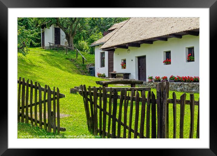 Backyard - Holloko Framed Mounted Print by Laszlo Konya