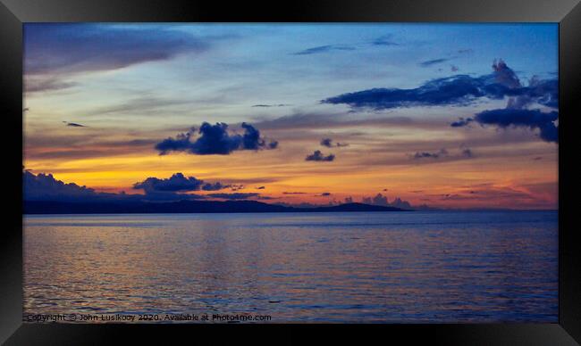 twilight at Lake Poso Framed Print by John Lusikooy