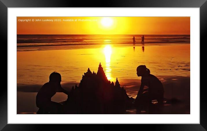 sand tower with sunset in the background Framed Mounted Print by John Lusikooy